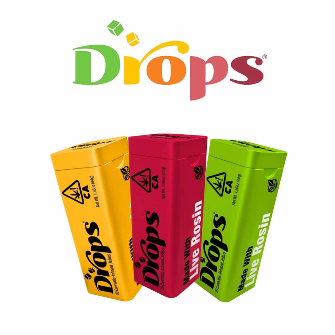 Colorful Drops cannabis edible packages featuring flavors like Blueberry Muffin, Tropical Punch, and Watermelon, with vibrant gummy candies displayed in front.
