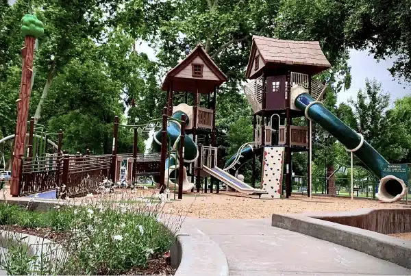 Howe Park open green field and splash pad in Arden Arcade, CA