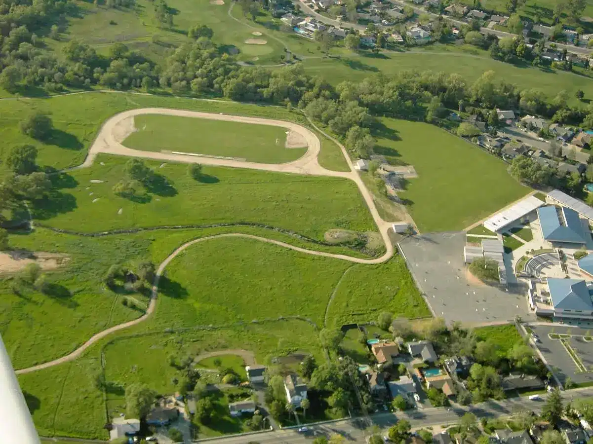 Aerial view of Johnson-Springview Park in Rocklin, CA, showing open fields, walking trails, and recreation areas