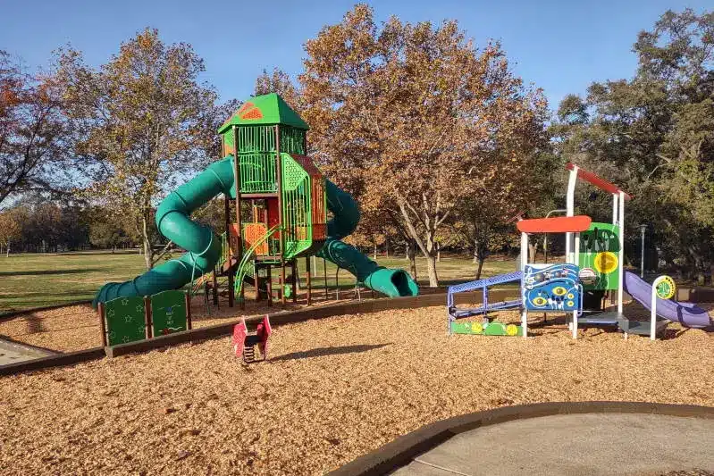 Playground and slides at Tempo Park in Citrus Heights, CA on a sunny day